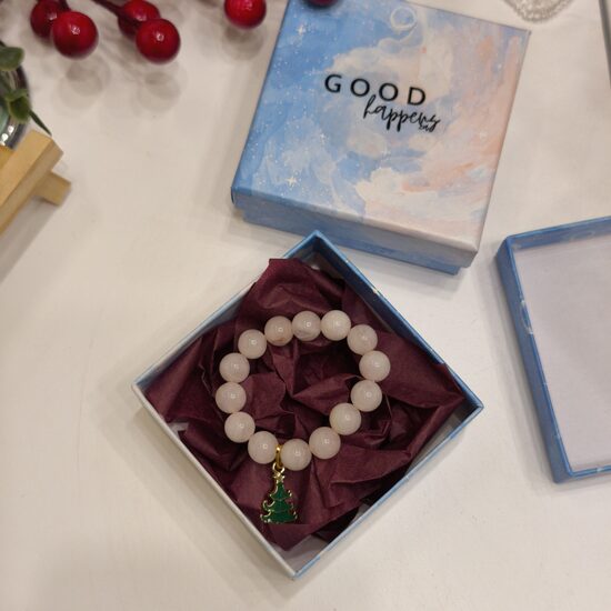 Kvarca aproce bērnam ar eglītes piekariņu