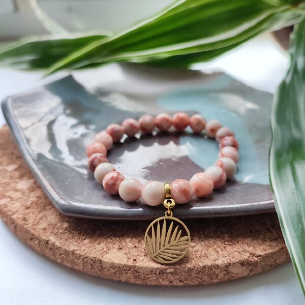 Orange jasper bracelet with palm leaf pendant