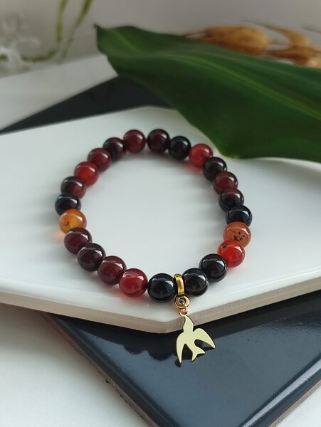 Brown agate bracelet with a bird