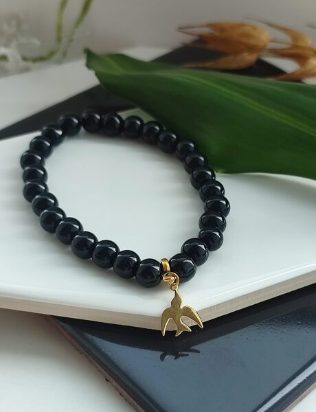 Black stone bracelet with bird