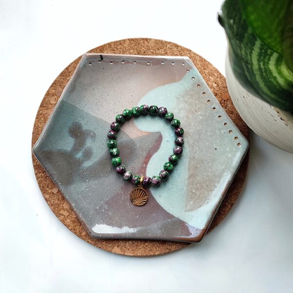 Green-purple stone bracelet with palm leaf pendant